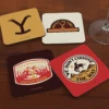 Yellowstone Logos Coasters With Mahogany Holder 1 Yellowstone Logos Coasters With Mahogany Holder -Yellowstone Store YS YLOGO2 100244 MF