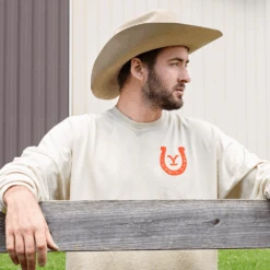 Yellowstone Protect The Brand Oversized Spirit Jersey -Yellowstone Store YS Spirit Jersey tan male lifestyle1