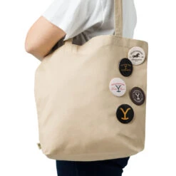 Yellowstone Logos Pin Set 37 Yellowstone Logos Pin Set -Yellowstone Store set of pin buttons white 2.25 front 66a0b8a3ed77e white